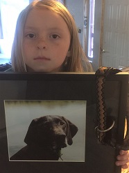 Photo of 8-year-old Roxy Marie and dog Abby, who was killed by M-44 in this spot